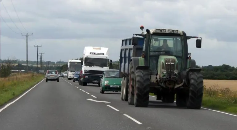 Stuck behind farm machinery on the road? Take it easy!